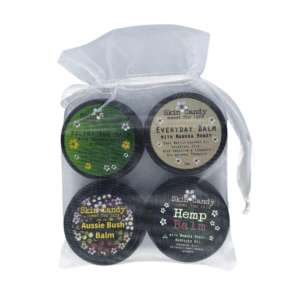 4 SkinCandy Balms in a clear bag