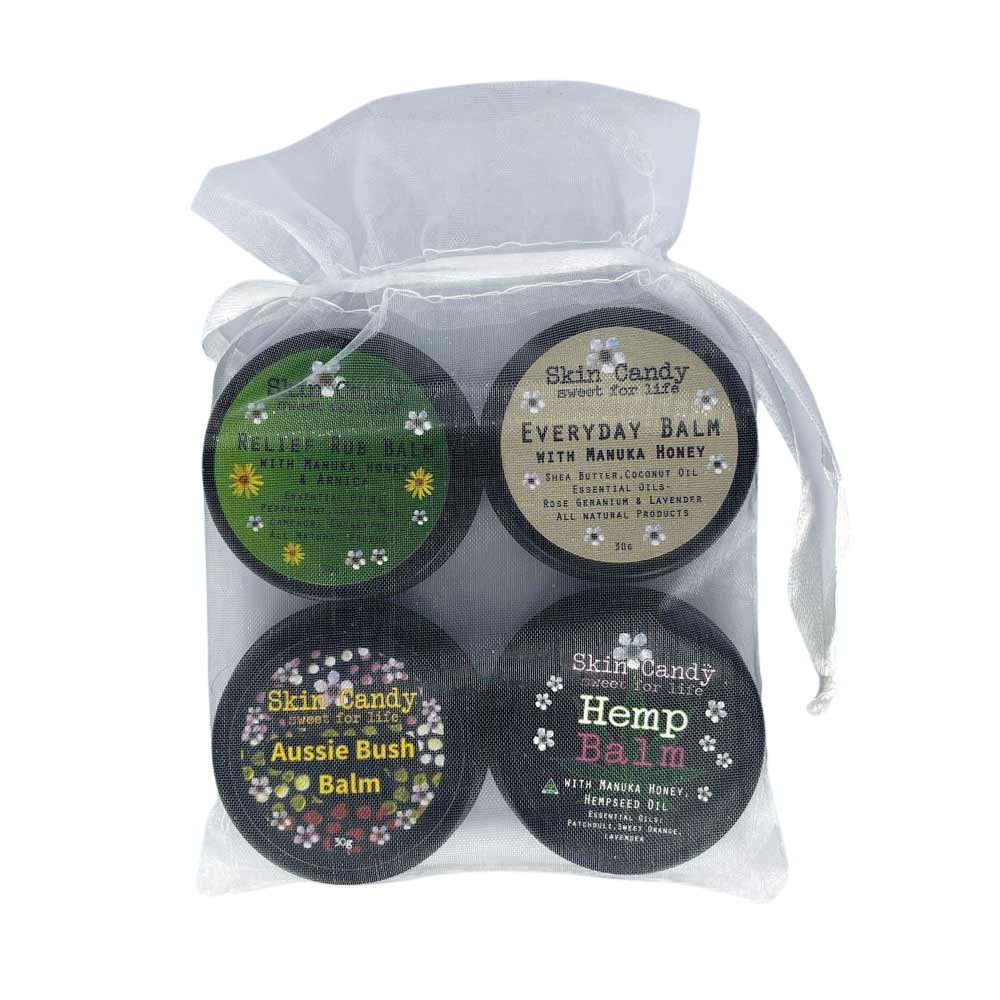 4 SkinCandy Balms in a clear bag
